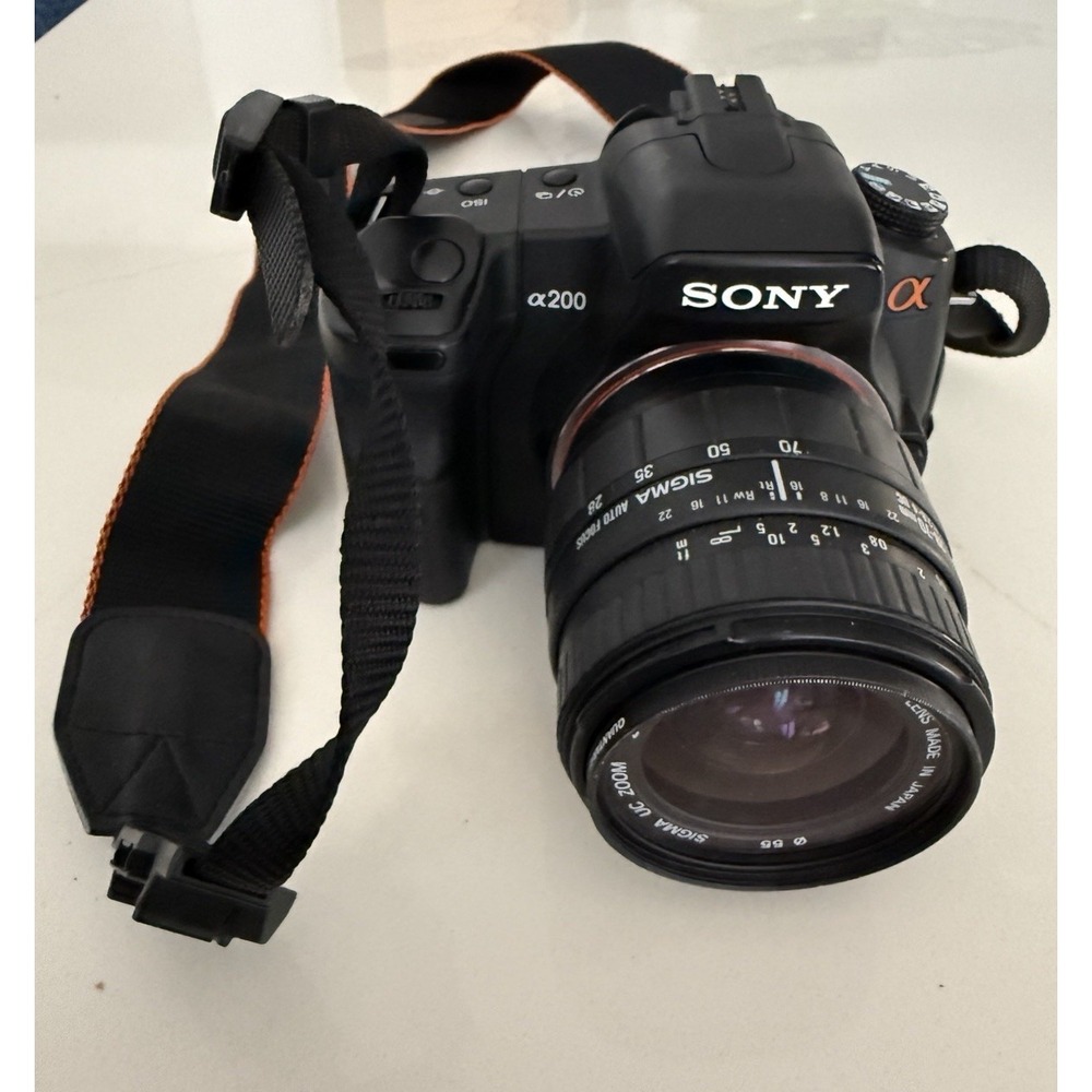 Sony Alpha A200 DSLR Camera with Sigma 28-70mm Zoom Lens & Strap Working